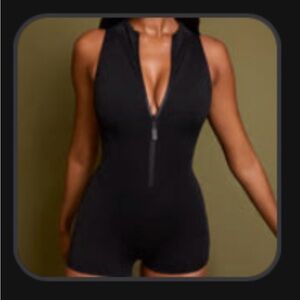 Sleeveless Surfy Shortie -
 Black Zip-Up One Piece Swimsuit